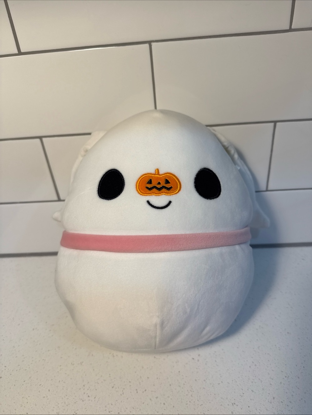 Squishmallows White Ghost Plush with Pink Band and Orange Pumpkin Face